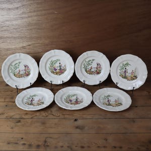 Set of 7 Sarreguemines Terre de Fer dessert plates with Asian motifs
