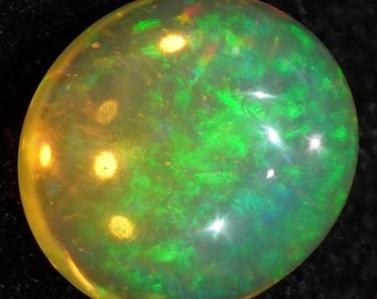 Mexican Natural Fire Opal - 10.1×9.2×5.3mm, 3.2ct. Round cabochon with vivid color play. Rare, ethically - sourced gem for unique jewelry.