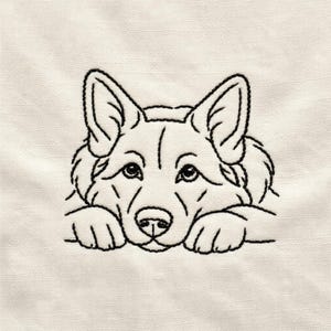 Puede incluir: Bordado negro de la cara de un perro sobre tela color crema. El perro tiene orejas grandes y erguidas, una nariz detallada y patas en la parte inferior. El diseño es simple y elegante, ideal para la decoración del hogar o aplicaciones textiles. La tela tiene un aspecto texturizado.