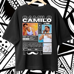 May include: Black t-shirt with a white graphic of Colombian singer Camilo. The graphic includes a photo of Camilo, the text "Camilo", "La Tribu", "New EP", and the date "16 Marzo 1994".