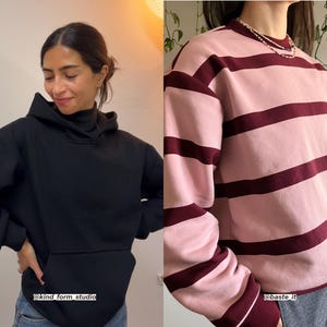 Puede incluir: Una sudadera con capucha negra con bolsillo de canguro. La imagen tambi&eacute;n muestra una camisa de manga larga a rayas rosa y burdeos. Los textos "@kind form studio" y "@baste.it" son visibles. La sudadera se combina con unos vaqueros azules.