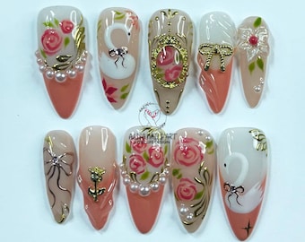 Uñas postizas con diseño de rosa y cisne, juego de uñas almendradas largas con perlas, dije dorado, puntas francesas, arte de uñas romántico, uñas postizas con temática de amor, regalos