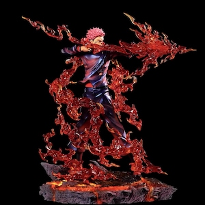 Detailed anime figure statue depicting a powerful cursed king and heroic fighter locked in battle, collectible display model for fans.