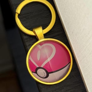 Chaveiro de carta Pokémon Love Ball