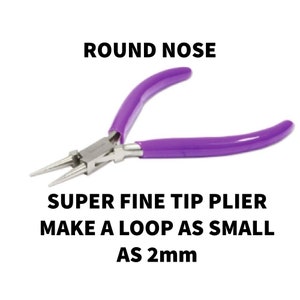 May include: Round nose pliers with purple rubberized handles and silver metal tips. The text on the image reads: ROUND NOSE, SUPER FINE TIP PLIER, MAKE A LOOP AS SMALL AS 2mm. These pliers feature a hinge mechanism and tapered jaws for precision work.