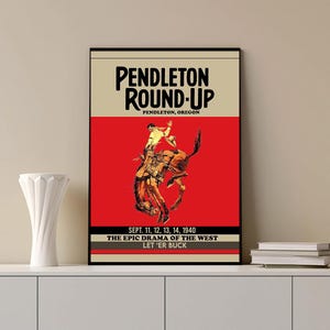May include: A vintage poster advertising the Pendleton Round-Up, a rodeo event held in Pendleton, Oregon. The poster features a cowboy riding a bucking bronco, with the text "Pendleton Round-Up", "Pendleton, Oregon", "Sept. 11, 12, 13, 14, 1940", "The Epic Drama of the West", and "Let 'er Buck".