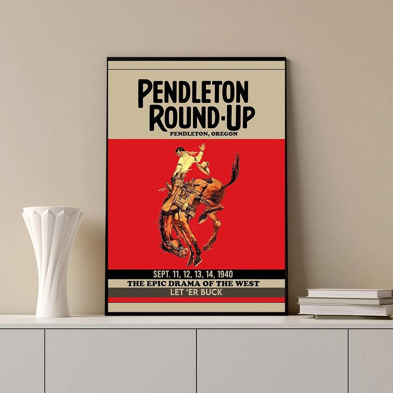 May include: A vintage poster advertising the Pendleton Round-Up, a rodeo event held in Pendleton, Oregon. The poster features a cowboy riding a bucking bronco, with the text "Pendleton Round-Up", "Pendleton, Oregon", "Sept. 11, 12, 13, 14, 1940", "The Epic Drama of the West", and "Let 'er Buck".