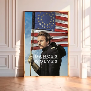 May include: A movie poster for the film "Dances With Wolves" featuring a man in a military uniform holding an American flag with 13 stars in a circle. The text "Dances With Wolves" is written in white letters on a black background.