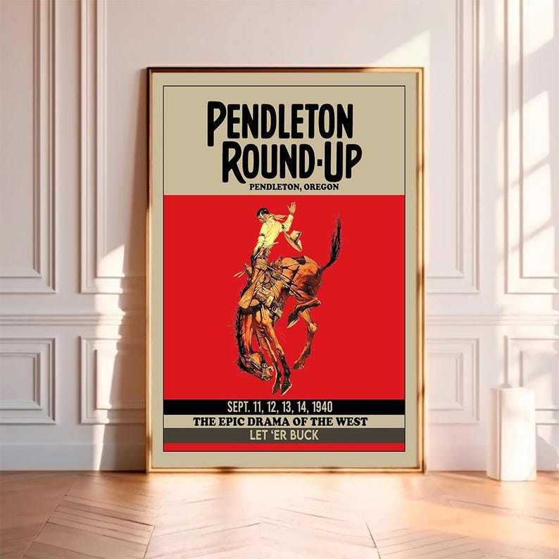 May include: A vintage poster advertising the Pendleton Round-Up, a rodeo event held in Pendleton, Oregon. The poster features a cowboy riding a bucking bronco, with the text "PENDLETON ROUND-UP", "PENDLETON, OREGON", "SEPT. 11, 12, 13, 14, 1940", "THE EPIC DRAMA OF THE WEST", and "LET 'ER BUCK".