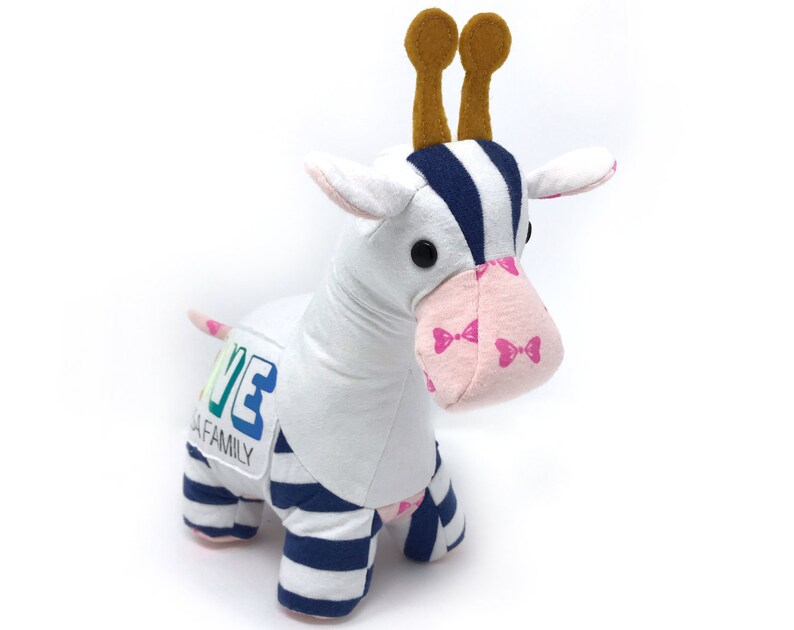 stuffed animal made from baby clothes