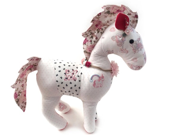 stuffed animal made from baby clothes