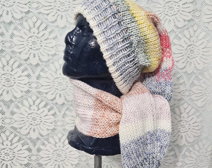 140-long stocking beanie Rainbow mist with pink and matching tassel length is 45"