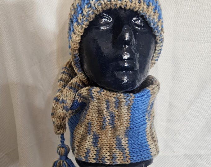 151-long knit stocking hat blue with Mirage and tassel
