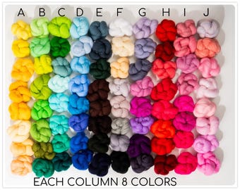 May include: A close-up of 80 small balls of yarn in 10 different colors arranged in 8 rows of 10 balls each. Each column represents a different color. The text "EACH COLUMN 8 COLORS" is printed below the balls of yarn.
