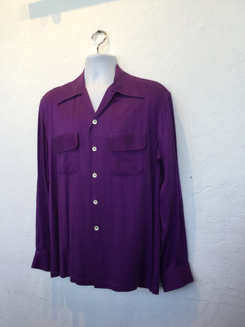 Available in X large 1950s vintage reproduction Hollywood Rogue purple rayon gabardine shirt