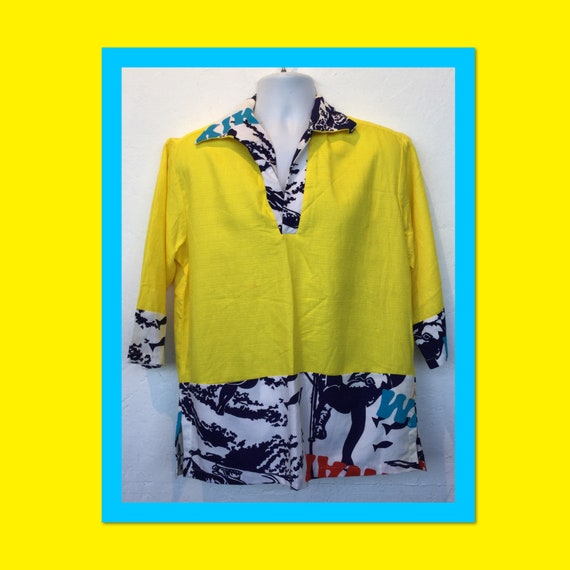 Vintage 1960s pullover tiki gaucho hawaiian shirt.
