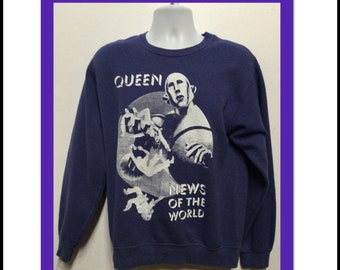 Vintage printed blue/purple rock "Queen-News of the World" sweatshirt. Size medium