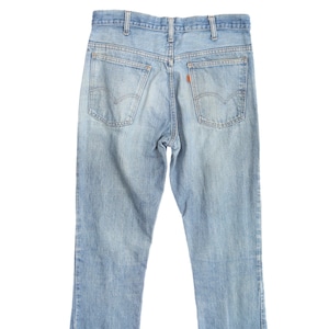 Vintage levi&#39;s bell bottom pants / orange tab / made in usa / era 1970&#39;s - 1980&#39;s / denim / light wash