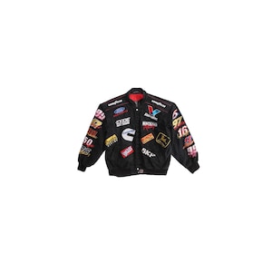 May include: A black racing jacket featuring numerous embroidered sponsor logos including Ford Racing, Valvoline, Exide Batteries, Cummins, Roush Racing, Bosch, John Deere, and Goodyear. The sleeves display large numbers and colorful graphic accents.