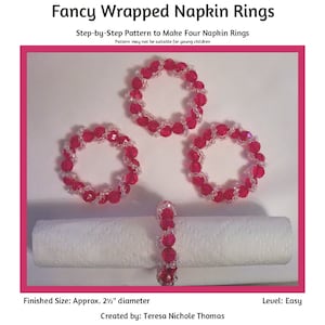 May include: Four pink and clear beaded napkin rings, each approximately 2 1/2 inches in diameter, are shown on a white surface. A white napkin is wrapped around one of the rings. The text "Fancy Wrapped Napkin Rings" is at the top of the image. The text "Step-by-Step Pattern to Make Four Napkin Rings" is below the image of the rings. The text "Pattern may not be suitable for young children" is below the second line of text. The text "Finished Size: Approx. 2 1/2" diameter" is at the bottom left of the image. The text "Level: Easy" is at the bottom right of the image. The text "Created by: Teresa Nichole Thomas" is centered below the text "Finished Size: Approx. 2 1/2" diameter" and "Level: Easy".