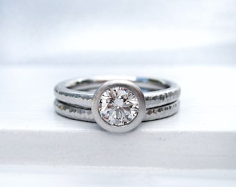 Platinum and Diamond bezel set engagement ring, Pacific Ring engagement and band set