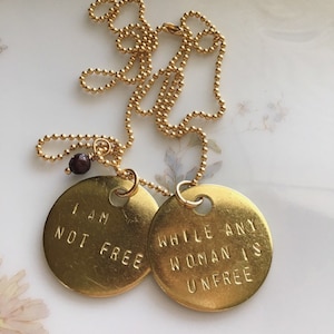 Audre Lorde Quote Necklace: Hand Stamped Brass, Garnet Bead, I am not free while any woman is unfree