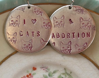 I Love Cats and Abortion handstamped earrings - silver and pink version