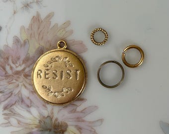 Resist charm / gold with floral / no color added