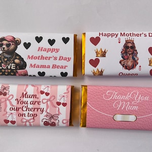 May include: Four chocolate bar wrappers with different designs for Mother's Day. The first wrapper features a cartoon bear wearing sunglasses and a pink hat with the text "Happy Mother's Day Mama Bear". The second wrapper features a cartoon woman with a crown and the text "Happy Mother's Day Queen". The third wrapper features a pink and white striped background with cherries and the text "Mum, You are our Cherry on top". The fourth wrapper features a pink background with a white envelope and the text "Thank You Mum".