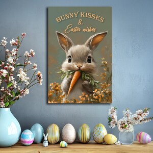 May include: A cute cartoon bunny rabbit holding a carrot in its mouth. The bunny is surrounded by yellow flowers and the text "Bunny Kisses & Easter Wishes" is at the top of the image.
