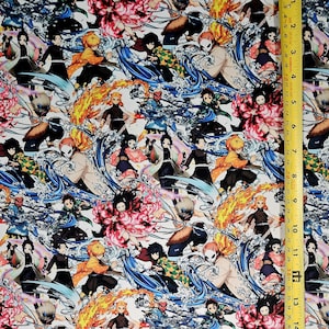 May include: A white fabric featuring a repeating pattern of anime characters from the show Demon Slayer. The characters are shown in various poses and expressions, with some characters surrounded by flames and others by water. The fabric is a vibrant mix of colours, including red, blue, yellow, and green.