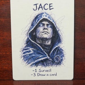 May include: A rectangular game card featuring a blue ink scribble-style illustration of a hooded figure. The name JACE is printed at the top. Below the illustration, the text reads -1 Surveil and -3 Draw a card on a white background.