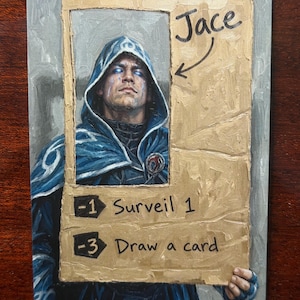 May include: A rectangular trading card featuring a painted illustration of a figure in a blue hooded cloak with glowing eyes. The card includes the text Jace, -1 Surveil 1, and -3 Draw a card, set against a textured tan background with a grey border.