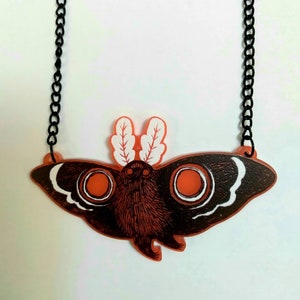 Mothman Guardian translucent red acrylic charm necklace