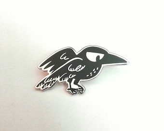 Disdainful Crow enamel pin