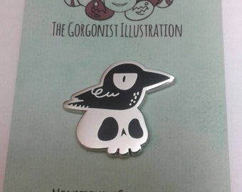 NeverYorick grumpy crow on a skull hard literary goth enamel pin