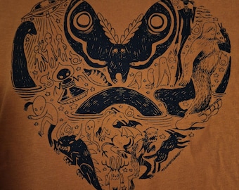 Cryptid Heart cryptozoology lovers creepy cute super soft hand screen printed orange t-shirt