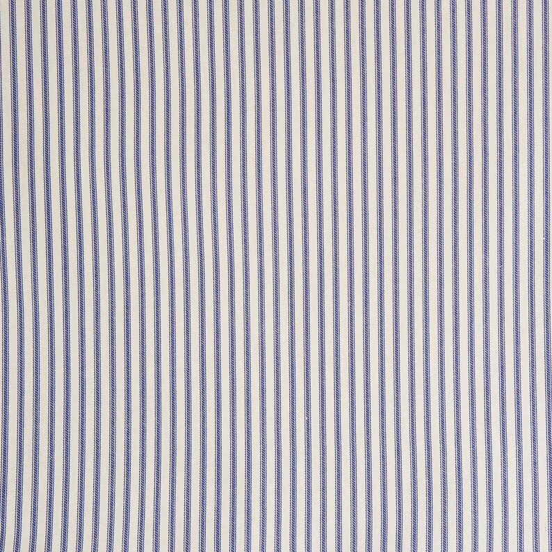 close up of navy and cream classic ticking stripe fabric