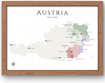 May include: A map of Austria's wine regions, showing the different wine-producing areas. The map is framed in a light brown wood frame. The map is labeled with the names of the regions, including Burgenland, Styria, and Vienna.