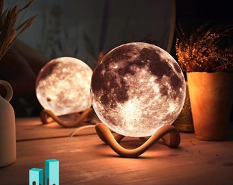 Moon table lamp with curved or stone-like base – Magical light for your home