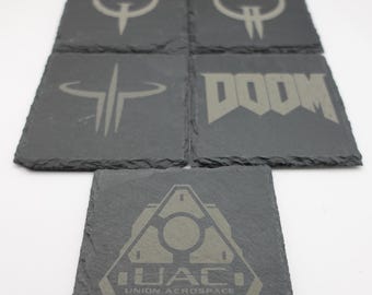 Quake, Doom & UAC logos laser engraved slate coasters - gaming nostalgia made of natural stone