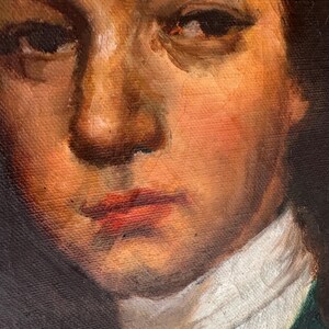 Pode incluir: Close-up de uma pintura a &oacute;leo que retrata o rosto de uma pessoa. O sujeito tem cabelo escuro, olhos castanhos e tez clara com bochechas rosadas. Eles est&atilde;o usando uma camisa branca com gola e uma jaqueta verde. A pintura tem pinceladas vis&iacute;veis.