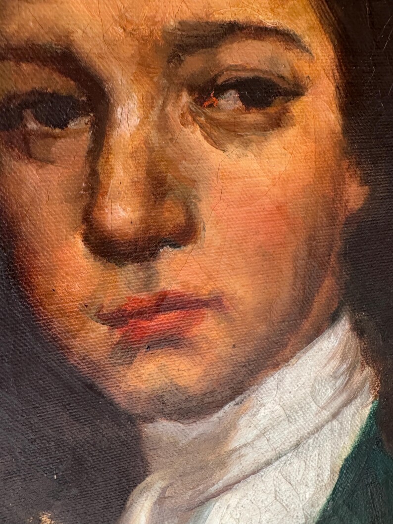 Pode incluir: Close-up de uma pintura a &oacute;leo que retrata o rosto de uma pessoa. O sujeito tem cabelo escuro, olhos castanhos e tez clara com bochechas rosadas. Eles est&atilde;o usando uma camisa branca com gola e uma jaqueta verde. A pintura tem pinceladas vis&iacute;veis.