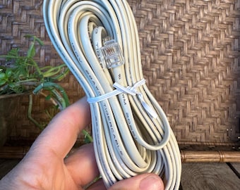 TigerCable RJ11 Telephone Cord - Extra Long Coiled Flat Cable - 28 AWG Silver Satin Wire - Landline DSL Fax Cord