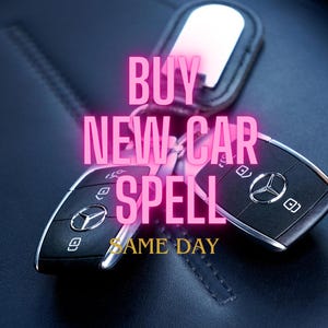May include: Two silver car keys with a black leather key chain. The keys have a Mercedes-Benz logo. The text "BUY NEW CAR SPELL SAME DAY" is in pink letters.