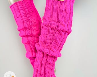 Scaldamuscoli da donna in lana merino lavorati a mano, color rosa neon.