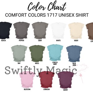 May include: Color chart for Comfort Colors 1717 unisex shirts. The chart displays various shirt colors, including black, pepper, gray, white, ivory, espresso, bay, moss, chalky mint, blue jean, blossom, crimson, and berry.