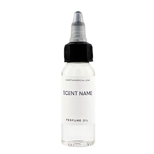 May include: A clear plastic squeeze bottle containing perfume oil with a black screw-on cap and a pointed applicator tip. The white label features the text SOMETHINSPECIAL.COM, SCENT NAME, and PERFUME OIL in black sans-serif lettering.
