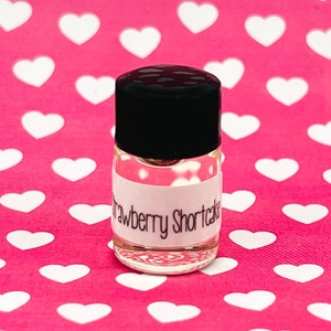 Strawberry Shortcake Perfume Oil Sample. Mini 1/16 oz Trial Size. Vanilla Cake, Fresh Strawberry, Rich Vanilla Cream. Vegan + Cruelty Free.