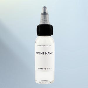 May include: A clear plastic squeeze bottle containing perfume oil with a black screw-on cap and a pointed applicator tip. The white label features the text SOMETHINSPECIAL.COM, SCENT NAME, and PERFUME OIL in black sans-serif lettering.